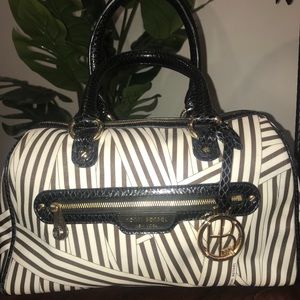 White brown and black Henri Bendel bag.